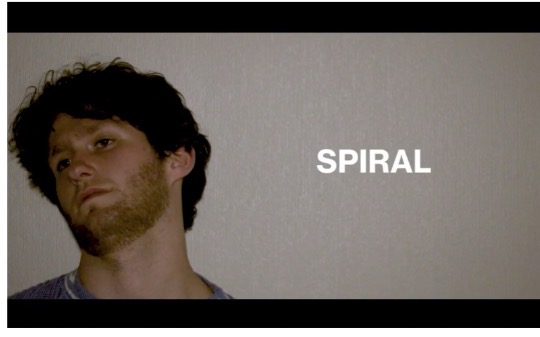 Ryder Kaplan in a title frame from the short film Spiral